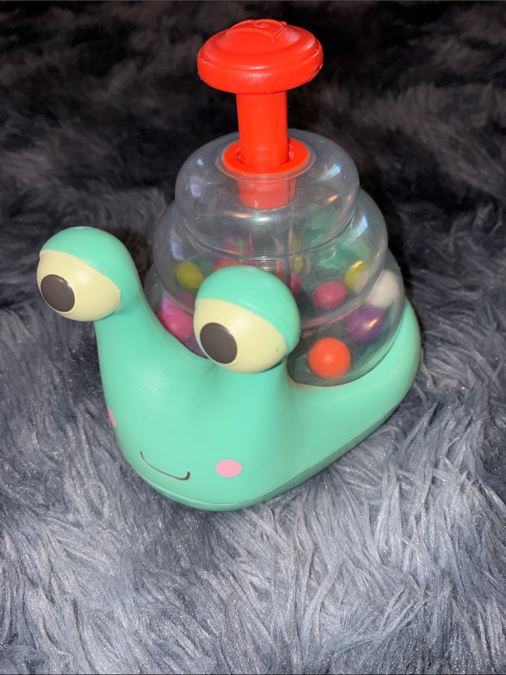B. toys Light-up Snail Ball Popper Escar-Gloooooow roll